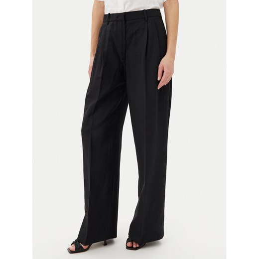 Tommy Hilfiger Spodnie materiałowe WW0WW45460 Czarny Relaxed Fit ze sklepu MODIVO w kategorii Spodnie damskie - zdjęcie 182650585