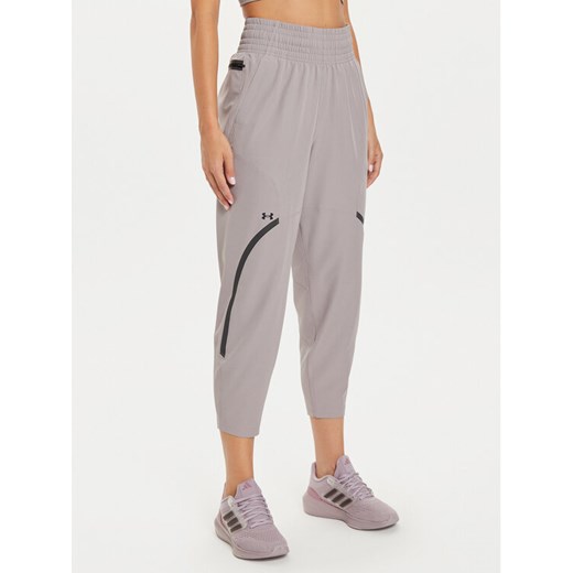 Under Armour Spodnie outdoor UA Unstoppable 1382741 Beżowy Loose Fit ze sklepu MODIVO w kategorii Spodnie damskie - zdjęcie 182651339