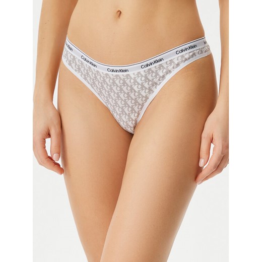 Calvin Klein Underwear Stringi 000QD5043E Écru ze sklepu MODIVO w kategorii Majtki damskie - zdjęcie 182651569