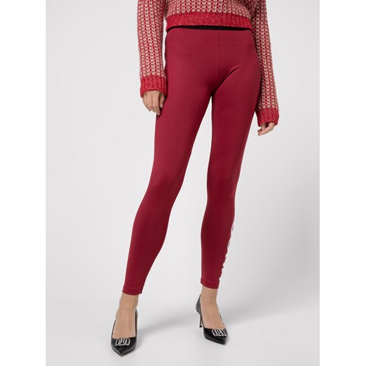 Hugo Legginsy Delessie 50439062 Czerwony Slim Fit ze sklepu MODIVO w kategorii Spodnie damskie - zdjęcie 182651747