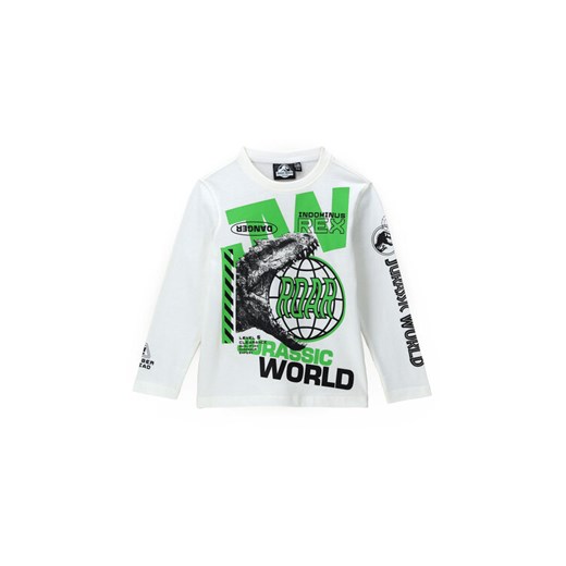 Original Marines Bluzka JURASSIC WORLD DCAV2628B Biały Regular Fit ze sklepu MODIVO w kategorii T-shirty chłopięce - zdjęcie 182651869