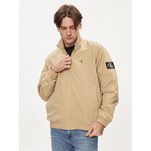 Calvin Klein Jeans Kurtka przejściowa Harrington J30J325102 Beżowy Regular Fit ze sklepu MODIVO w kategorii Kurtki męskie - zdjęcie 182653306