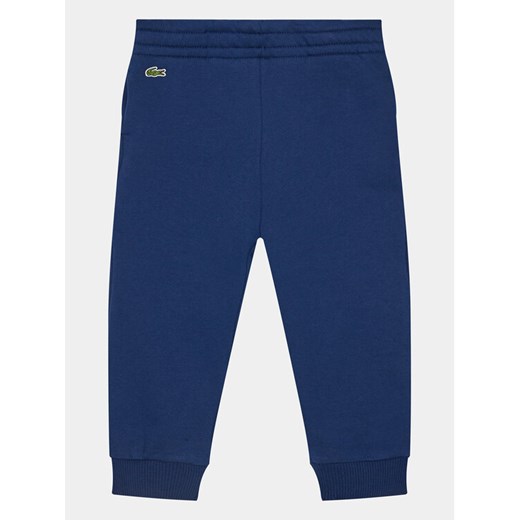 Lacoste Spodnie dresowe XJ1213 Granatowy Regular Fit ze sklepu MODIVO w kategorii Spodnie chłopięce - zdjęcie 182653999