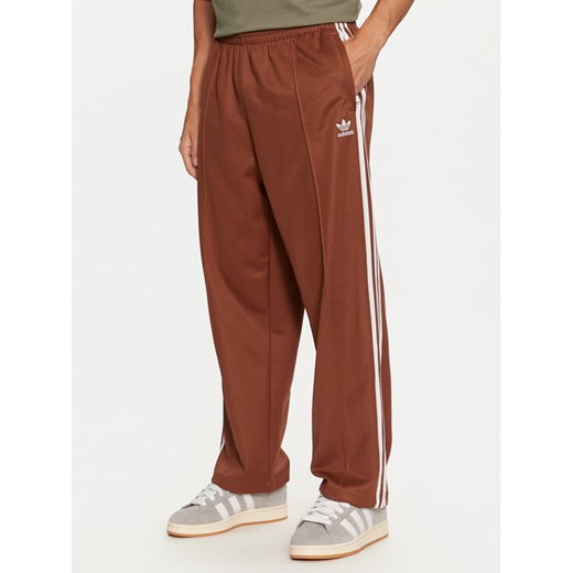 adidas Spodnie dresowe adicolor Firebird IZ2476 Brązowy Baggy Fit XXL MODIVO