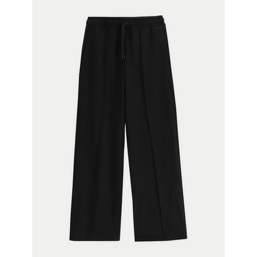Coccodrillo Spodnie dresowe WC5120101VGA Czarny Regular Fit ze sklepu MODIVO w kategorii Spodnie dziewczęce - zdjęcie 182654668