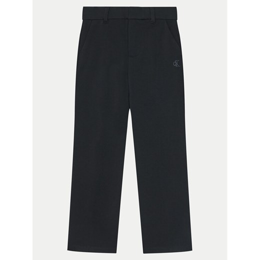Calvin Klein Jeans Spodnie materiałowe IB0IB02341 Czarny Slim Fit ze sklepu MODIVO w kategorii Spodnie dziewczęce - zdjęcie 182654799