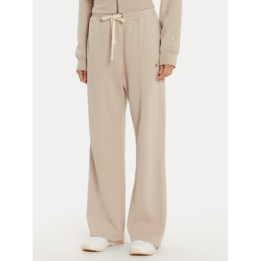 Champion Spodnie dresowe 117638 Beżowy Wide Leg ze sklepu MODIVO w kategorii Spodnie damskie - zdjęcie 182655135