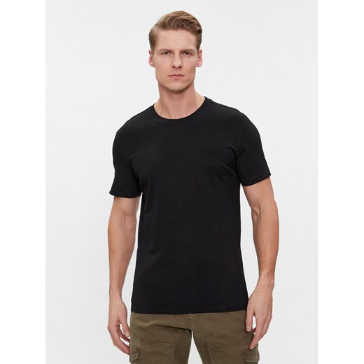 Guess T-Shirt Ss Cn Treated M4RI49 KBL31 Czarny Slim Fit ze sklepu MODIVO w kategorii T-shirty męskie - zdjęcie 182656357
