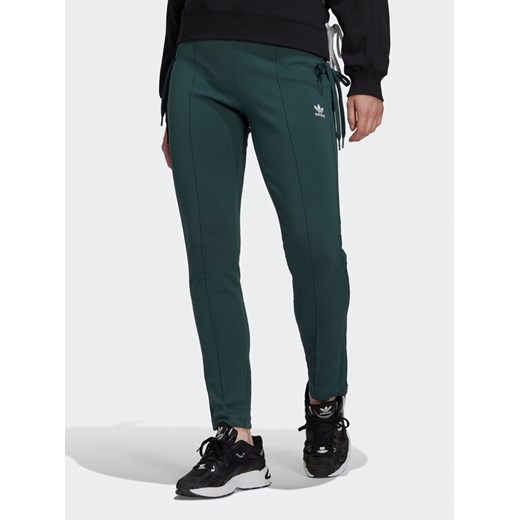 adidas Spodnie dresowe Always Original Laced HK5083 Zielony Slim Fit ze sklepu MODIVO w kategorii Spodnie damskie - zdjęcie 182656828