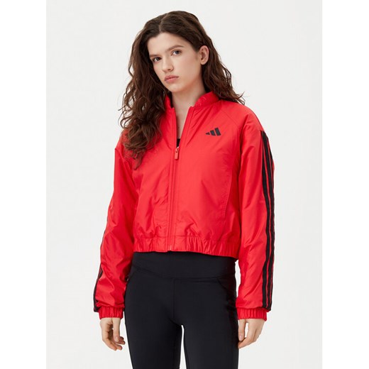 adidas Kurtka bomber Essentials 3-Stripes JP1724 Czerwony Loose Fit ze sklepu MODIVO w kategorii Kurtki damskie - zdjęcie 182657136