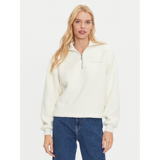 Calvin Klein Jeans Bluza J20J224180 Écru Relaxed Fit ze sklepu MODIVO w kategorii Bluzy damskie - zdjęcie 182657975