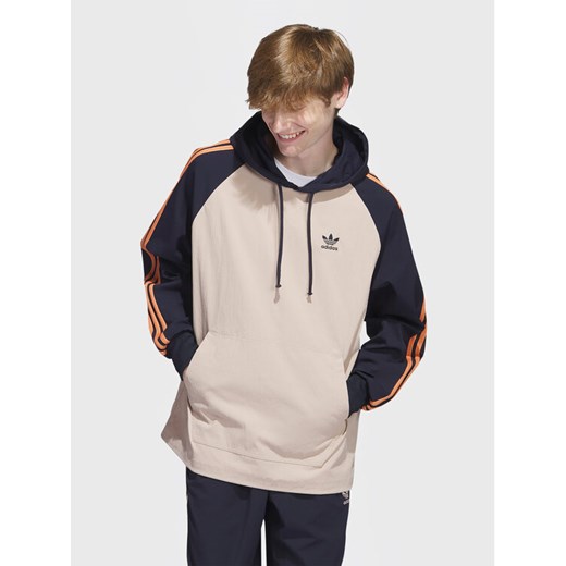 adidas Bluza SST Hooded Windbreaker IC5537 Brązowy Regular Fit ze sklepu MODIVO w kategorii Bluzy męskie - zdjęcie 182658798