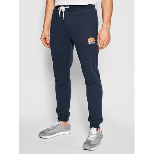 Ellesse Spodnie dresowe Ovest SHS01763 Granatowy Regular Fit ze sklepu MODIVO w kategorii Spodnie męskie - zdjęcie 182659248