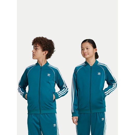 adidas Bluza adicolor SST IY7452 Turkusowy Regular Fit ze sklepu MODIVO w kategorii Bluzy chłopięce - zdjęcie 182660195