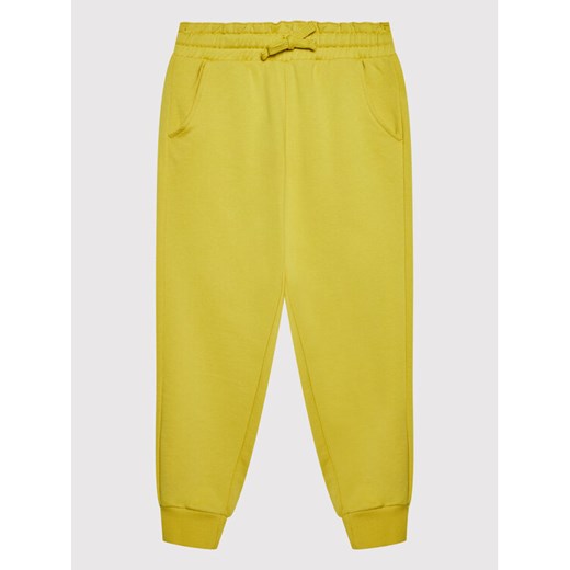 United Colors Of Benetton Spodnie dresowe 3QLACF00H Żółty Regular Fit ze sklepu MODIVO w kategorii Spodnie dziewczęce - zdjęcie 182660256
