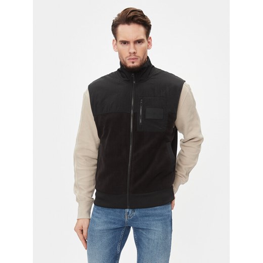 Calvin Klein Jeans Kamizelka J30J324109 Czarny Relaxed Fit ze sklepu MODIVO w kategorii Kamizelki męskie - zdjęcie 182662748