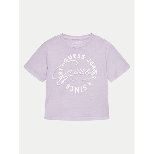 Guess T-Shirt J4GI30 K8HM4 Fioletowy Boxy Fit ze sklepu MODIVO w kategorii Bluzki dziewczęce - zdjęcie 182662869