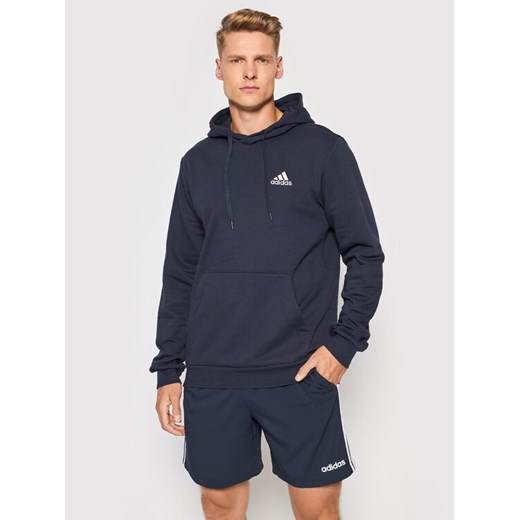 adidas Bluza FeelCozy Hoodie H12216 Granatowy Regular Fit ze sklepu MODIVO w kategorii Bluzy męskie - zdjęcie 182663196