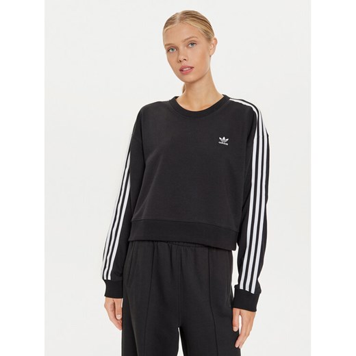 adidas Bluza 3-Stripes IR5522 Czarny Loose Fit ze sklepu MODIVO w kategorii Bluzy damskie - zdjęcie 182663768