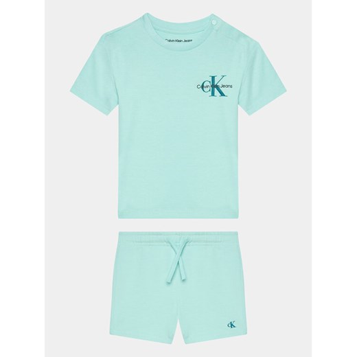 Calvin Klein Jeans Komplet t-shirt i spodenki Monogram Logo IN0IN00176 Niebieski Regular Fit ze sklepu MODIVO w kategorii Komplety niemowlęce - zdjęcie 182664057