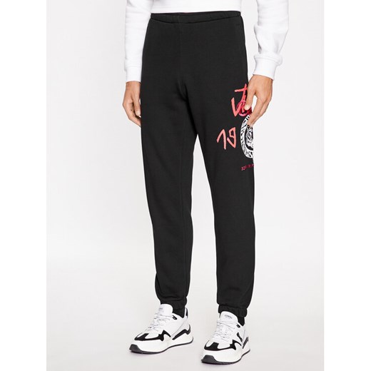 Just Cavalli Spodnie dresowe 75OAAI01 Czarny Regular Fit ze sklepu MODIVO w kategorii Spodnie męskie - zdjęcie 182664306