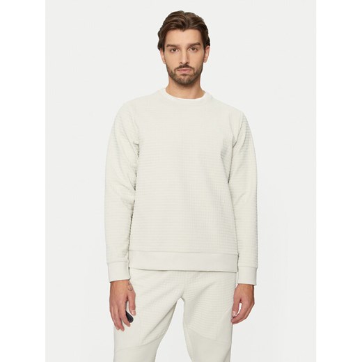 Under Armour Bluza UA Unstoppable 1387904 Écru Regular Fit ze sklepu MODIVO w kategorii Bluzy męskie - zdjęcie 182664319