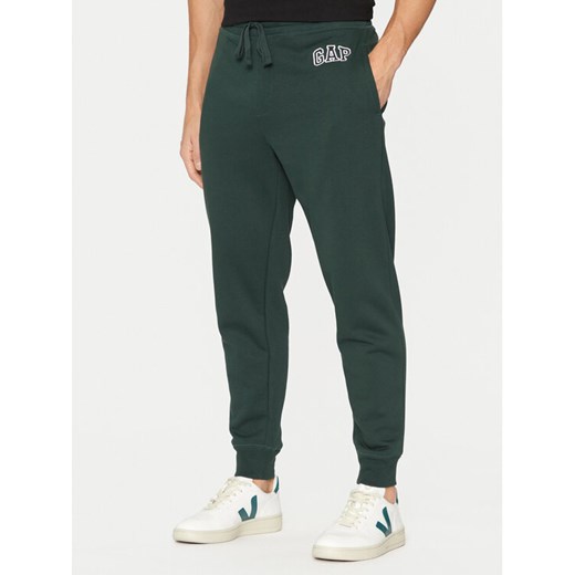 Gap Spodnie dresowe 542221-00 Zielony Regular Fit ze sklepu MODIVO w kategorii Spodnie męskie - zdjęcie 182665665