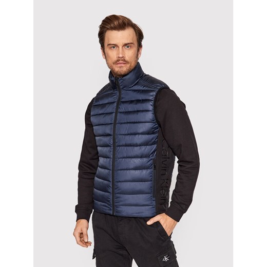Calvin Klein Kamizelka Recycled Side K10K108292 Granatowy Regular Fit ze sklepu MODIVO w kategorii Kamizelki męskie - zdjęcie 182665798