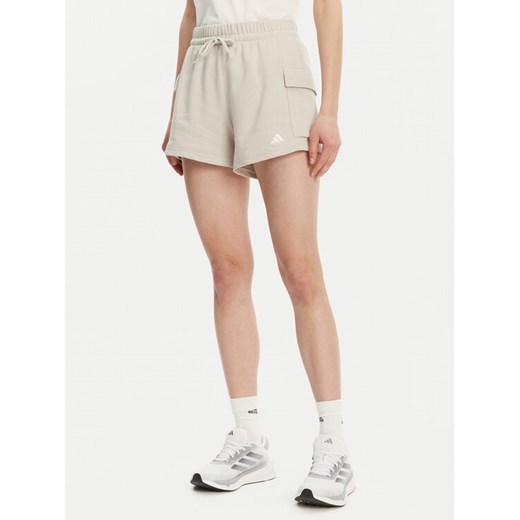 adidas Szorty sportowe Essentials Small Logo JC5699 Beżowy Loose Fit ze sklepu MODIVO w kategorii Szorty - zdjęcie 182666365