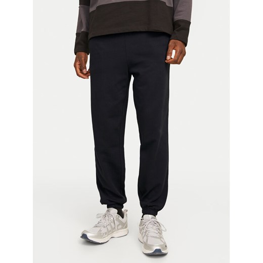 Jack&Jones Spodnie dresowe Morgan 12257964 Czarny Regular Fit ze sklepu MODIVO w kategorii Spodnie męskie - zdjęcie 182666648