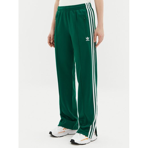 adidas Spodnie dresowe adicolor Classics Firebird JC8284 Zielony Regular Fit ze sklepu MODIVO w kategorii Spodnie damskie - zdjęcie 182666777