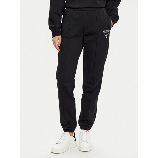 Guess Spodnie dresowe V5RB13 KC3D2 Czarny Regular Fit ze sklepu MODIVO w kategorii Spodnie damskie - zdjęcie 182668468