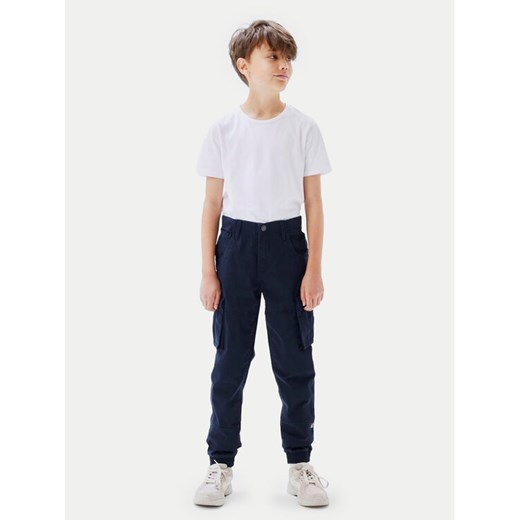 NAME IT Spodnie materiałowe Bamgo 13151735 Granatowy Regular Fit ze sklepu MODIVO w kategorii Spodnie chłopięce - zdjęcie 182668858