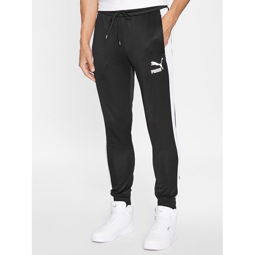 Puma Spodnie dresowe Iconic T7 530098 Czarny Regular Fit ze sklepu MODIVO w kategorii Spodnie męskie - zdjęcie 182671019