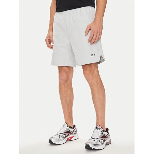 Reebok Szorty sportowe Strength 100075594 Szary Regular Fit ze sklepu MODIVO w kategorii Spodenki męskie - zdjęcie 182671479