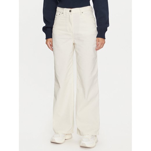 Tommy Jeans Spodnie materiałowe Claire DW0DW19917 Écru Loose Fit ze sklepu MODIVO w kategorii Spodnie damskie - zdjęcie 182672298