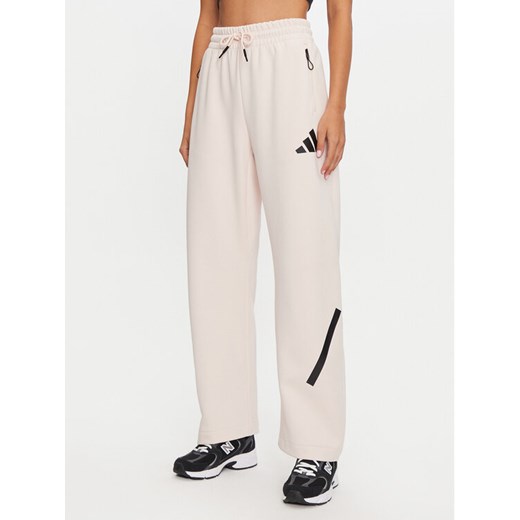 adidas Spodnie dresowe Z.N.E. Barrel JF4780 Różowy Loose Fit ze sklepu MODIVO w kategorii Spodnie damskie - zdjęcie 182673198