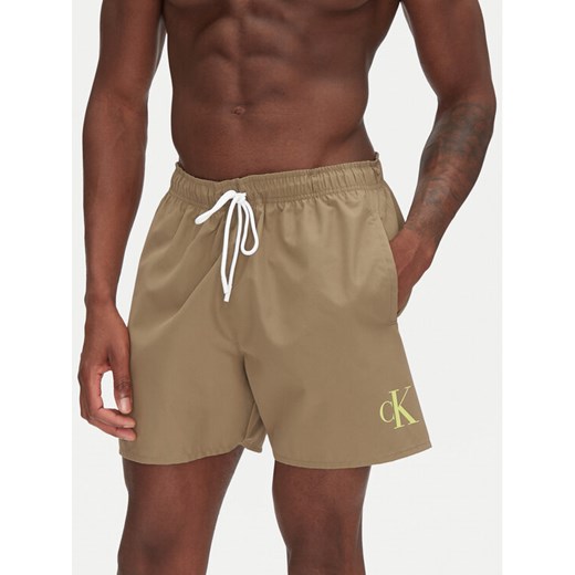 Calvin Klein Swimwear Szorty kąpielowe KM0KM01101 Khaki Regular Fit ze sklepu MODIVO w kategorii Kąpielówki - zdjęcie 182673359