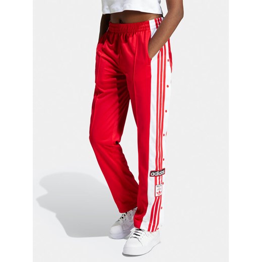 adidas Spodnie dresowe Adibreak IP0620 Czerwony Regular Fit ze sklepu MODIVO w kategorii Spodnie damskie - zdjęcie 182673366