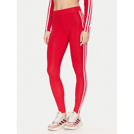 adidas Legginsy Adicolor Classics 3-Stripes Leggings IB7382 Czerwony ze sklepu MODIVO w kategorii Spodnie damskie - zdjęcie 182673646