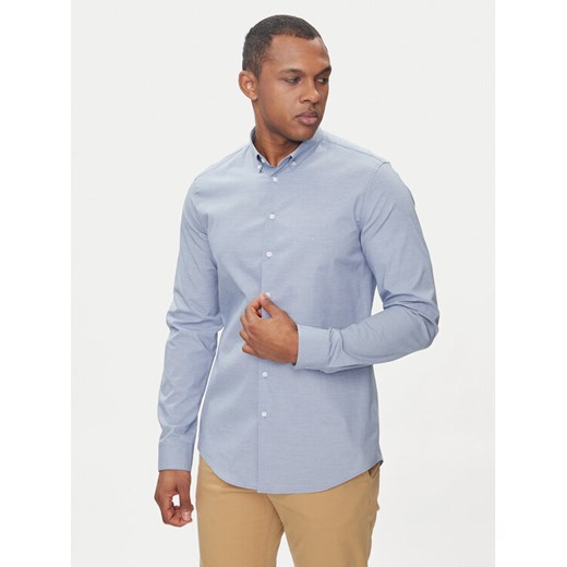 Calvin Klein Koszula Chambray K10K112679 Niebieski Slim Fit ze sklepu MODIVO w kategorii Koszule męskie - zdjęcie 182673775
