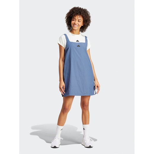 adidas Sukienka letnia City Escape IS0670 Niebieski Loose Fit ze sklepu MODIVO w kategorii Sukienki - zdjęcie 182673935
