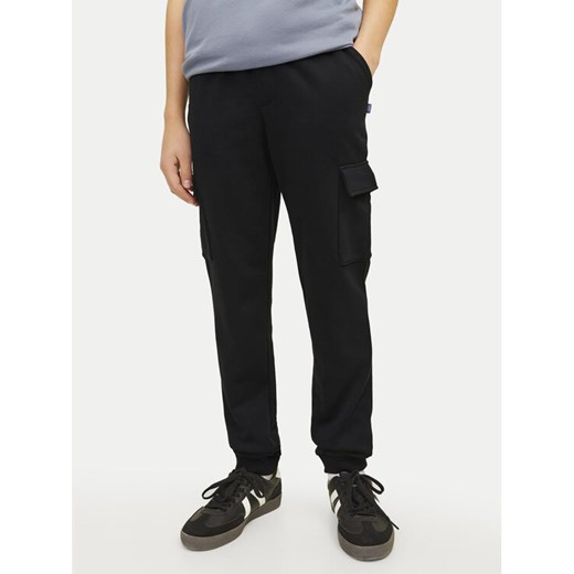 Jack&Jones Junior Spodnie dresowe Gordon 12254214 Czarny Slim Fit ze sklepu MODIVO w kategorii Spodnie chłopięce - zdjęcie 182675145