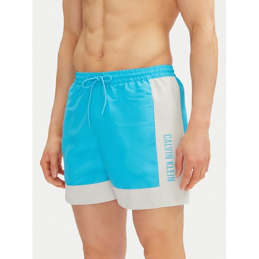 Calvin Klein Swimwear Szorty kąpielowe KM0KM01095 Niebieski Regular Fit ze sklepu MODIVO w kategorii Kąpielówki - zdjęcie 182676216