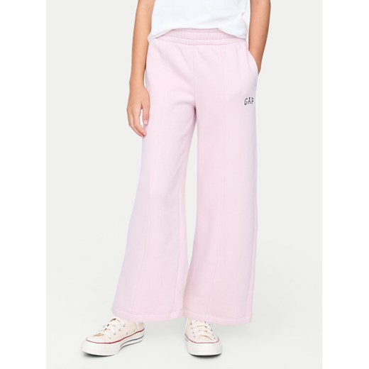 Gap Spodnie dresowe 628710-00 Różowy Regular Fit ze sklepu MODIVO w kategorii Spodnie dziewczęce - zdjęcie 182676628