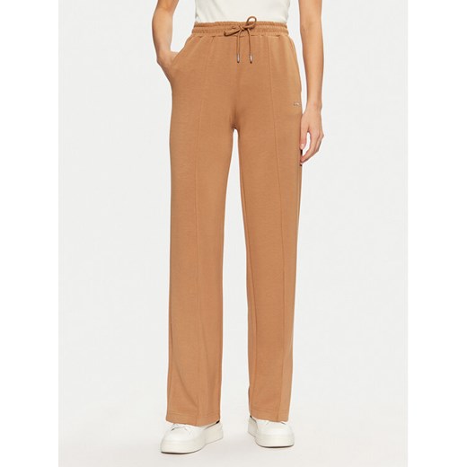Guess Spodnie dresowe V5RB19 KCOB2 Brązowy Regular Fit ze sklepu MODIVO w kategorii Spodnie damskie - zdjęcie 182677606