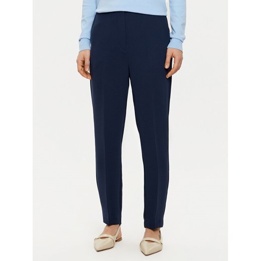Tommy Hilfiger Chinosy WW0WW45450 Granatowy Slim Fit ze sklepu MODIVO w kategorii Spodnie damskie - zdjęcie 182678306