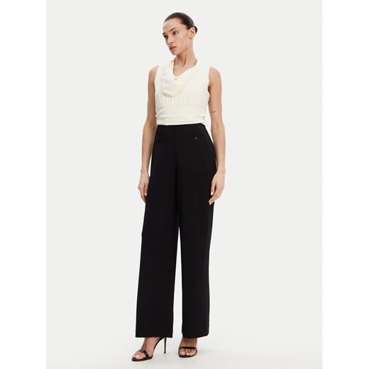 DKNY Kombinezon DD4JGD26 Czarny Regular Fit ze sklepu MODIVO w kategorii Kombinezony damskie - zdjęcie 182678439