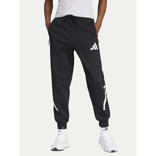 adidas Spodnie dresowe Z.N.E. JC9309 Czarny Regular Fit ze sklepu MODIVO w kategorii Spodnie damskie - zdjęcie 182679366