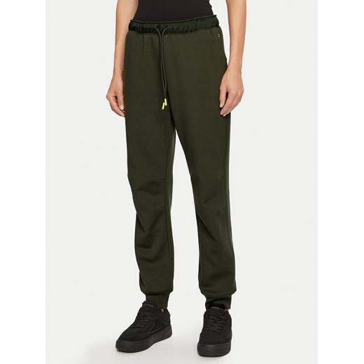 Champion Spodnie dresowe 117477 Zielony Slim Fit ze sklepu MODIVO w kategorii Spodnie damskie - zdjęcie 182679405